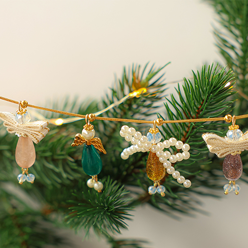 Cr&eacute;ez des designs magiques avec des perles Polaris en forme de goutte et des ailes d'ange !