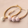Bracelets festifs avec des nouveaux pompons scintillants