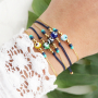Confectionner de magnifiques bracelets avec les nouvelles perles &OElig;il porte-bonheur :