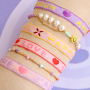 Utilisez ce joli ruban texte pour votre collection de bracelets 