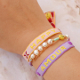 Utilisez ce joli ruban texte pour votre collection de bracelets 